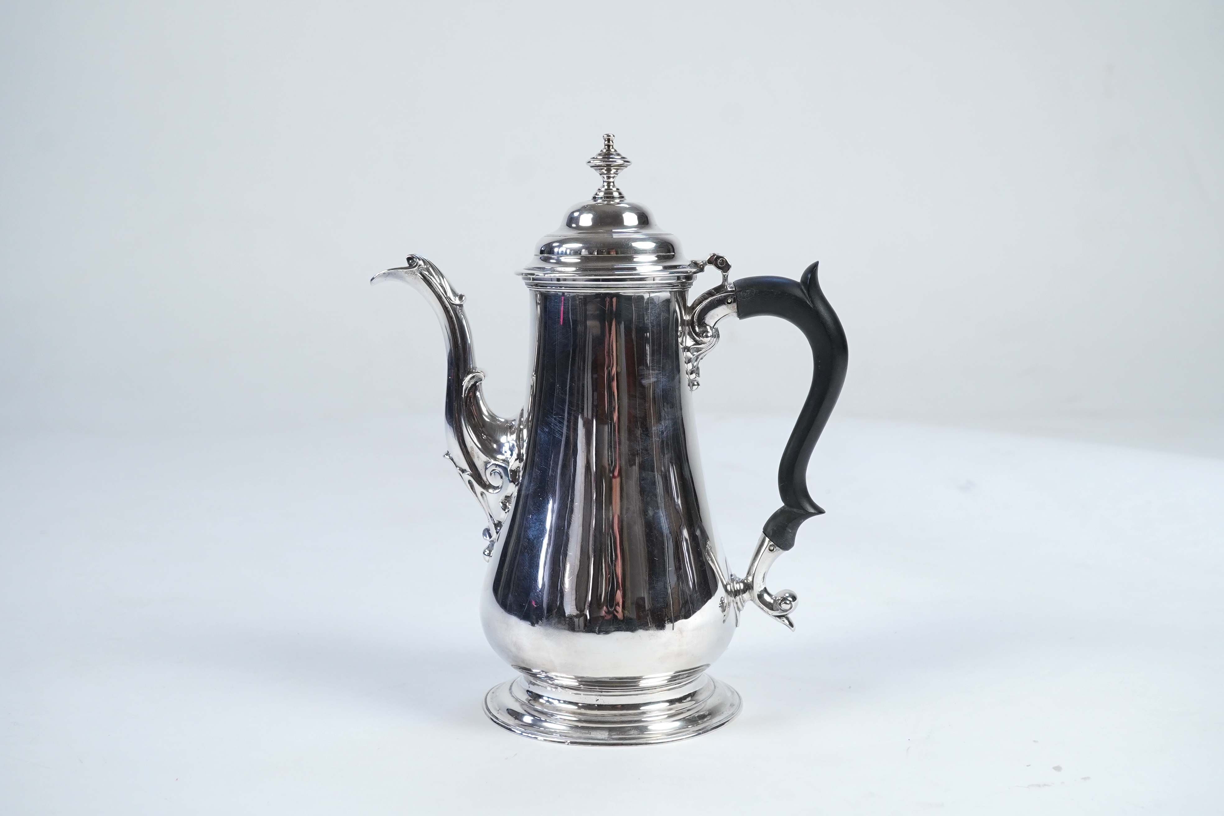 A late George II silver coffee pot, by William & Robert Peaston